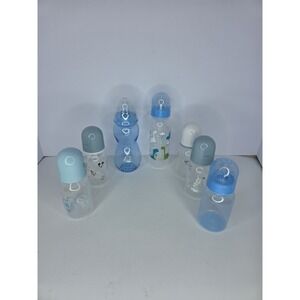 7: 2 Baby King 9‎ & 5 oz & 4 Cudlie 4 oz. & 1 Nuby 10 oz. Clear & Blue Bottles